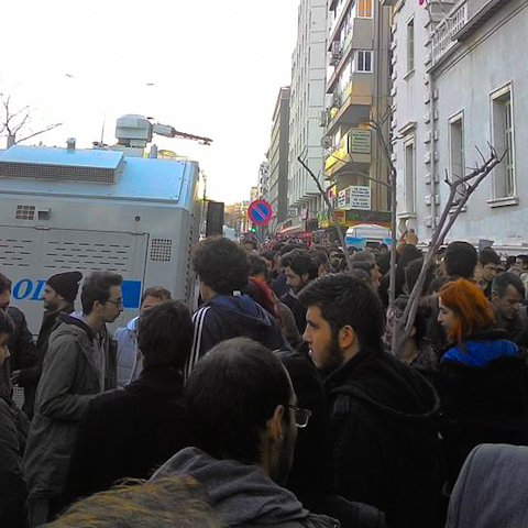 The presence of water cannon notwithstanding, protestors march to the French Consulate in Izmir.  Photo credit:  Tolga Yildiz.